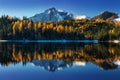 Early morning sunrise at the beautiful lake and Crowfoot mountain. Autumn Lake is a small lake in western Alberta, Canada. Banff Royalty Free Stock Photo