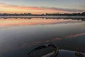 Early morning sunrise over the lake on a biat