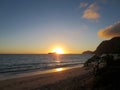 Early Morning Sunrise on Waimanalo Beach over Rabbit Island burs Royalty Free Stock Photo