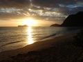 Early Morning Sunrise on Waimanalo Beach over Rabbit Island burs Royalty Free Stock Photo