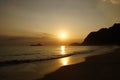 Early Morning Sunrise on Waimanalo Beach over Rock Island bursti Royalty Free Stock Photo