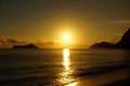 Early Morning Sunrise on Waimanalo Beach over Rock Island Royalty Free Stock Photo