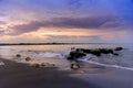 Early morning sunset / sunrise with Vew of volcano Agung mountains of Bali and sea and beach, Bali, Indonesia. Azure beach, rocky Royalty Free Stock Photo