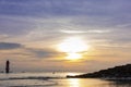 Early morning sunset or sunrise with Vew of volcano Agung mountains of Bali and sea and beach, Bali, Indonesia. Azure beach, rocky Royalty Free Stock Photo