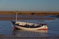 Early Morning, tides out, Old boat scene. Royalty Free Stock Photo