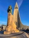 The statue of Leifur Ericson and Hallgrimskirkja church in Reykyavik Royalty Free Stock Photo