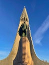 The statue of Leifur Ericson and Hallgrimskirkja church in Reykyavik Royalty Free Stock Photo