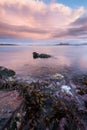 An early morning vertical seascape photographed at sunrise Royalty Free Stock Photo