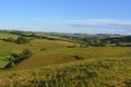 English summer landscape, patchwork of green rolling hills Royalty Free Stock Photo