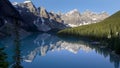 Early morning view of reflections on moraine lake in banff np, canada