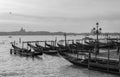 Early morning view of Venice waterfront with gondolas mooring Italy Royalty Free Stock Photo