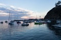 Early morning wide view of sunrise seascape, Avalon Bay, Santa Catalina Island with sailboats, yachts and fishing boats Royalty Free Stock Photo