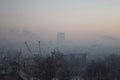Early morning winter fog city beginning of the day Royalty Free Stock Photo