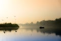 Early morning at yamuna ghat with golden sun, fog and blue water