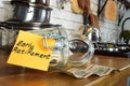 Early retirement concept. Glass jar with money on the home table. Royalty Free Stock Photo