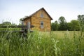 Early settlers' log cabin on the prairie
