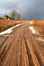 Early spring gravel road in village Royalty Free Stock Photo