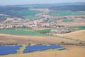 Early spring landscape with brown fields and solar power plant Royalty Free Stock Photo