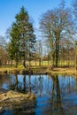Early spring landscape of European forest and water ponds in Konstancin-Jeziorna Springs Park - Park Zdrojowy w Konstancinie