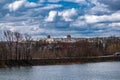 Early spring landscape, in the Rostov region in the city of Shakhty, on the Grushevka river. Sunny sunset in yellow and orange war Royalty Free Stock Photo