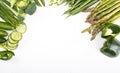 Early, spring veggies, isolated. Green seasonal vegetables on a white background, top view. Frame with a copy space.