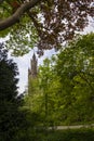 Peace Palace behind a woodland, Vredespaleis, under a pure gradient blue sky, seat of the ICJ, International Court of Justice, Royalty Free Stock Photo