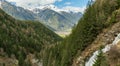 Early springtime view of the Oetztal valley as seen from the Stuibenfall waterfall in Umhausen. Steep mountains