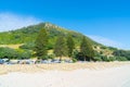 Early start to day walkers out on Mount boardwalk in front of Mount Camp and under landmark mountain