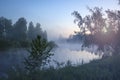 Early summer morning - fog over the river before dawn, a mysterious landscape Royalty Free Stock Photo