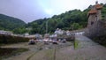 Early summer morning with mist view of Lynmouth Harbour, on the north coast of Devon, UK