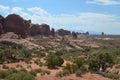 Early Summer in Utah: Looking Southeast in Arches National Park to the Formations of The Windows Section and the La Sal Mountains Royalty Free Stock Photo