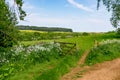An open gate to a view of rolling English countryside Royalty Free Stock Photo