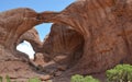 Early Summer in Utah: Looking up at Double Arch in Arches National Park