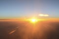 Early sunrise above clouds. Airplane view Royalty Free Stock Photo