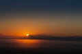 Early sunrise with ground fog and clear skies.