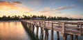 Early sunrise over the Naples Pier on the Gulf Coast of Naples,