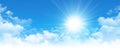 Early sunshine in a cloudy blue sky Royalty Free Stock Photo