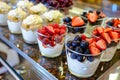 earlymorning coffee buffet with fresh fruit and yogurt parfaits Royalty Free Stock Photo