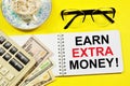 Earn extra money. Text label on the planning notebook.