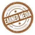 EARNED MEDIA text on brown round grungy stamp