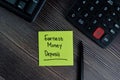 Earnest Money Deposit write on sticky notes isolated on office desk Royalty Free Stock Photo