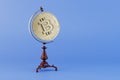 earnings on cryptocurrency around the world. bitcoin with a globe handle on a blue background. 3D render