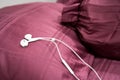 White earphone on the wooden table