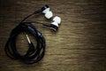 Earphone on old wood background. - space for your text