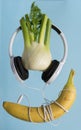 Earphones and banana popart fitness