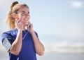 Earphones, runner and woman in nature with phone streaming audio, music or podcast mock up. Sports, fitness and female