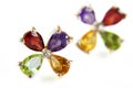 Earring with four stones as flowers, jewerly shop, pawnshop concept Royalty Free Stock Photo