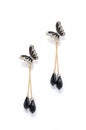 Earrings with black butterflies on a white background Royalty Free Stock Photo
