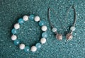 Earrings bracelet beads studio quality light Royalty Free Stock Photo