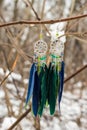 earrings of Dream catcher with feathers threads and beads rope hanging. Dreamcatcher handmade Royalty Free Stock Photo